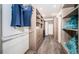 Large walk-in closet with ample shelving and drawer space at 455 Pinellas Bayway S # 2A, Tierra Verde, FL 33715