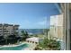 Waterfront view showcasing the pool and surrounding landscape at 632 Edgewater Dr # 532, Dunedin, FL 34698