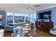 Spacious living room with hardwood floors and bay windows at 632 Edgewater Dr # 532, Dunedin, FL 34698