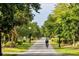 Image of tree-lined street perfect for biking at 632 Edgewater Dr # 532, Dunedin, FL 34698