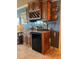 Built-in wet bar with wine rack and beverage cooler at 632 Edgewater Dr # 532, Dunedin, FL 34698