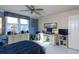 Bedroom with desk, dresser, and ceiling fan at 632 Edgewater Dr # 532, Dunedin, FL 34698
