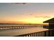 Sunset view over the water from a community deck at 632 Edgewater Dr # 532, Dunedin, FL 34698