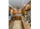 Bright kitchen with stainless steel appliances and granite counters at 632 Edgewater Dr # 532, Dunedin, FL 34698