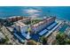 Aerial view of waterfront condo building with parking and boat slips at 632 Edgewater Dr # 532, Dunedin, FL 34698