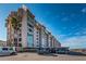 Multi-story building with parking and landscaping at 632 Edgewater Dr # 532, Dunedin, FL 34698
