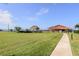 Community green space with a gazebo and waterfront views at 632 Edgewater Dr # 532, Dunedin, FL 34698