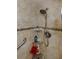 Large shower with tiled walls and safety bar at 632 Edgewater Dr # 532, Dunedin, FL 34698