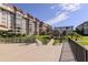 Pathway to the community lawn with building view at 632 Edgewater Dr # 532, Dunedin, FL 34698