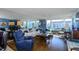 Spacious living room with hardwood floors and water views at 632 Edgewater Dr # 532, Dunedin, FL 34698