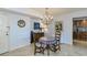 Bright dining area with table and chairs, near kitchen at 632 Edgewater Dr # 532, Dunedin, FL 34698