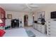 Serene bedroom with large art piece and ensuite bath at 632 Edgewater Dr # 532, Dunedin, FL 34698