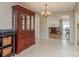 Dining room with hardwood floors and a wooden hutch at 741 Windward Way, Palm Harbor, FL 34685