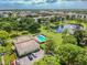 Community center with pool and parking, surrounded by greenery at 8198 Terrace Garden N Dr # 403, St Petersburg, FL 33709