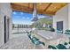 Outdoor kitchen with granite countertop and lake view at 8198 Terrace Garden N Dr # 403, St Petersburg, FL 33709