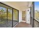 Spacious screened balcony with sliding doors at 8198 Terrace Garden N Dr # 403, St Petersburg, FL 33709