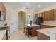 Modern kitchen with stainless steel appliances and island at 11004 Carnes St, Weeki Wachee, FL 34613