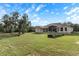 Single story home with a large backyard and shed at 11004 Carnes St, Weeki Wachee, FL 34613