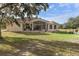 Single-story house with large backyard and mature trees at 11004 Carnes St, Weeki Wachee, FL 34613