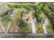 Aerial view showcasing home's location and surrounding properties at 11004 Carnes St, Weeki Wachee, FL 34613