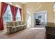 Home office with built-in shelving and large windows at 11004 Carnes St, Weeki Wachee, FL 34613