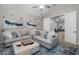 Cozy Gathering room featuring sectional sofa and game table at 13409 Oldenburg Dr, Hudson, FL 34667