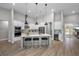 Spacious kitchen, island with seating, hardwood floors at 13409 Oldenburg Dr, Hudson, FL 34667