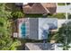 Aerial view of a home with a screened pool at 16011 Royal Aberdeen Pl, Odessa, FL 33556