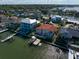 Waterfront property with private dock and boat lift at 18 Winston Dr, Belleair, FL 33756