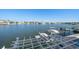 Stunning waterfront view with private dock and boat lift at 18 Winston Dr, Belleair, FL 33756