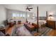 Spacious main bedroom with a post bed and water views at 18 Winston Dr, Belleair, FL 33756