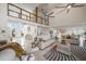 Open concept living room with high ceilings and water views at 18 Winston Dr, Belleair, FL 33756