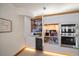 Modern kitchen with built-in bar and appliances at 18 Winston Dr, Belleair, FL 33756