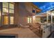 Relaxing patio area with pergola and lounge chairs at 18 Winston Dr, Belleair, FL 33756
