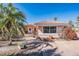 One-story home with brick walkway and tropical landscaping at 1840 Venetian Point Dr, Clearwater, FL 33755