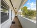 Exterior hallway with access to multiple units at 1975 W Bay Dr # 214, Largo, FL 33770