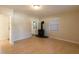 Bright living room featuring hardwood floors and a wood-burning stove at 2415 Durant Rd, Valrico, FL 33596