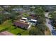 Aerial view of condo buildings with ample parking and green space at 2541 Laurelwood Dr # 8C, Clearwater, FL 33763