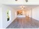 Open concept living space with tile floors and kitchen views at 25434 Colon Dr, Punta Gorda, FL 33983