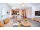 Open living room features a neutral color palette and plenty of natural light at 25434 Colon Dr, Punta Gorda, FL 33983