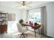 Home office with built-in shelving and plenty of workspace at 25434 Colon Dr, Punta Gorda, FL 33983