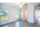 Spacious bedroom with tile floors and access to a bathroom at 25434 Colon Dr, Punta Gorda, FL 33983