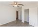 Bedroom with sliding door closet and ceiling fan at 25434 Colon Dr, Punta Gorda, FL 33983