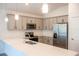 Modern kitchen featuring stainless steel appliances and white quartz countertops at 25434 Colon Dr, Punta Gorda, FL 33983