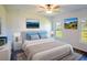 Spacious main bedroom with ample natural light and room for a king-size bed at 25434 Colon Dr, Punta Gorda, FL 33983