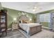 Cozy bedroom with a comfortable bed and plenty of natural light at 2939 Yucca Ct, Palm Harbor, FL 34684
