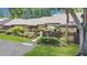 Neatly landscaped front yard with a spacious driveway at 2939 Yucca Ct, Palm Harbor, FL 34684