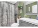Updated bathroom with a walk-in shower and modern vanity at 2939 Yucca Ct, Palm Harbor, FL 34684
