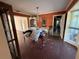 Dining room with brick flooring and a chandelier at 3275 Walnut Ne St, St Petersburg, FL 33704