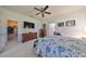 Bedroom with walk-in closet and ceiling fan at 377 Cedar Falls Dr, Apollo Beach, FL 33572